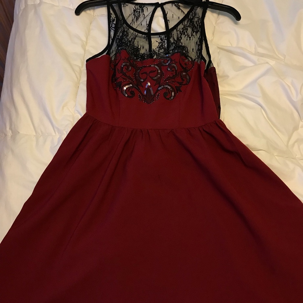 a red dress with black lace